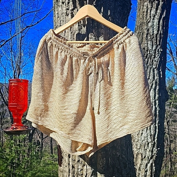 Anthropologie Pants - Gold loose shorts L